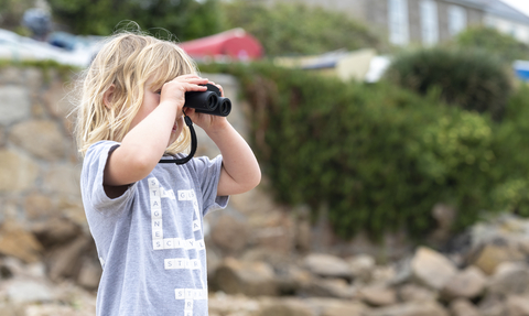 Child with binoculars