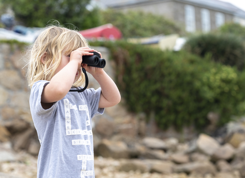 Child with binoculars